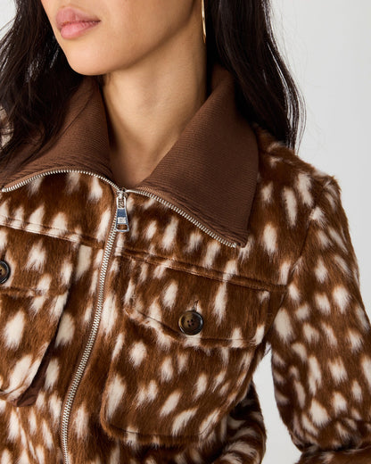 Abstract dot jacket zip and front pocket detail